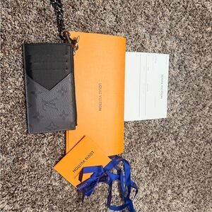 Louis Vuitton Black Card Holder multi color. In great condition.